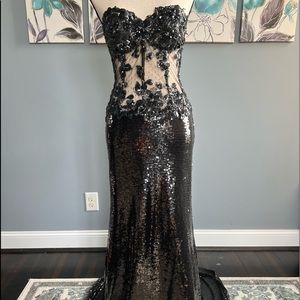 Night Moves Sequin black dress. Built in bra. See through panels